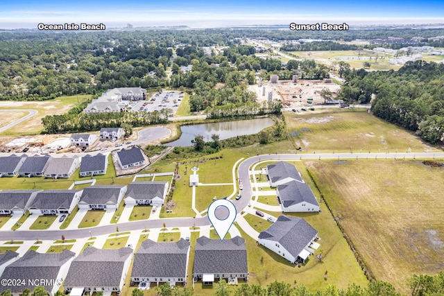 aerial view featuring a water view and a residential view