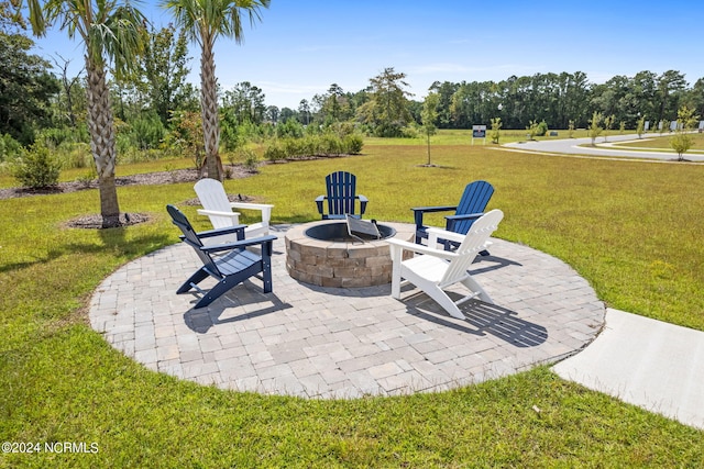 view of patio featuring an outdoor fire pit