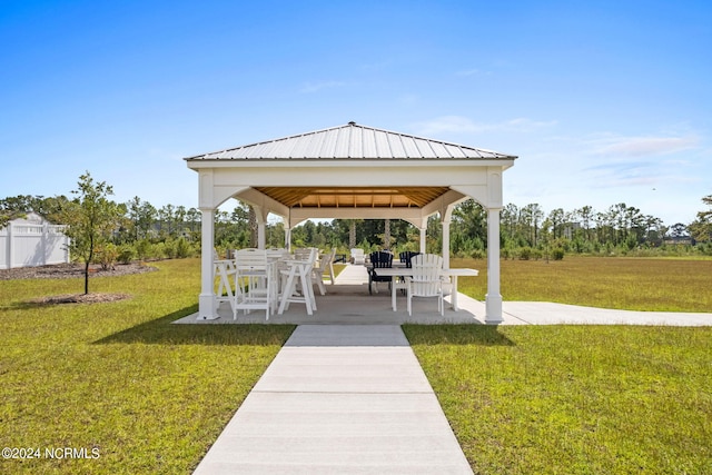 view of property's community featuring a gazebo and a yard