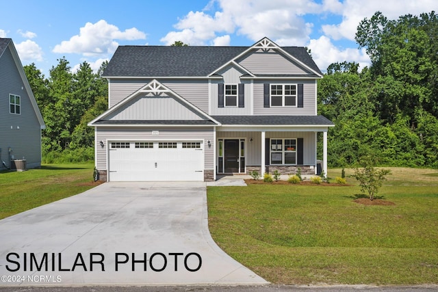 craftsman-style home with a porch, a garage, central air condition unit, and a front lawn