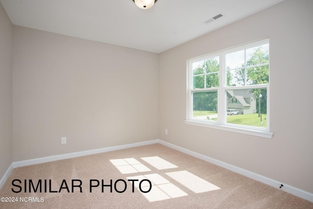 empty room featuring carpet