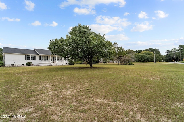 view of yard with a porch