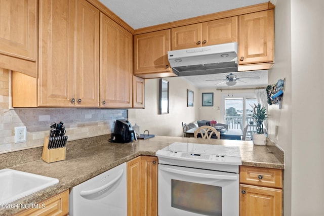 kitchen featuring decorative backsplash, white appliances, ceiling fan, and a textured ceiling