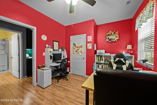 office space with hardwood / wood-style flooring and ceiling fan