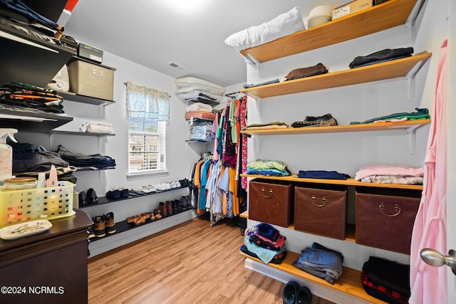 walk in closet featuring light wood-type flooring