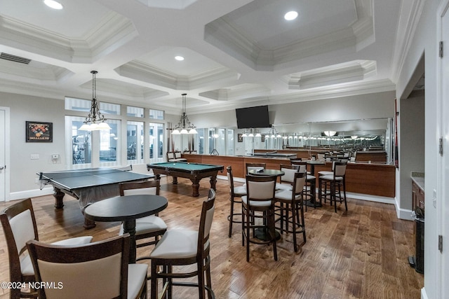 playroom featuring beam ceiling, coffered ceiling, wood-type flooring, ornamental molding, and pool table