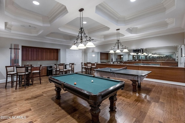 game room featuring coffered ceiling, pool table, wood-type flooring, and crown molding