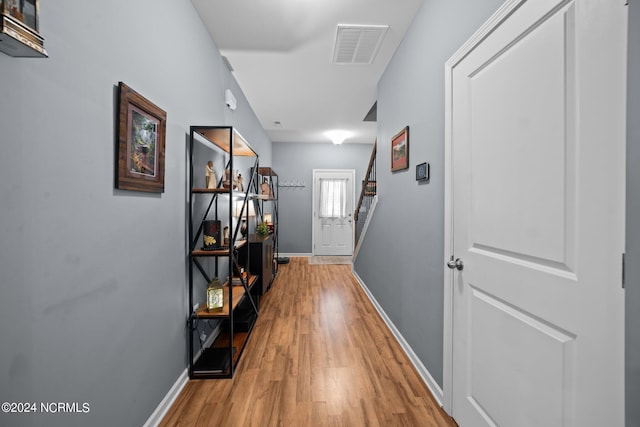 hall featuring hardwood / wood-style floors