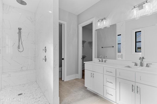 616 Waterstone Dr, Wilmington, NC 28411 - bathroom featuring double vanity, a marble finish shower, and toilet