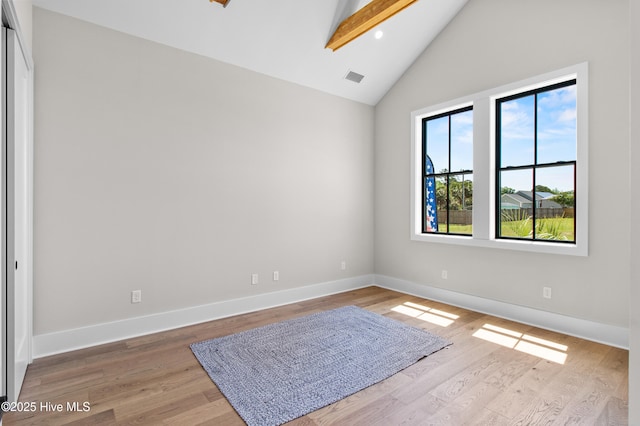 616 Waterstone Dr, Wilmington, NC 28411 - unfurnished room featuring baseboards, beamed ceiling, wood finished floors, high vaulted ceiling, and recessed lighting