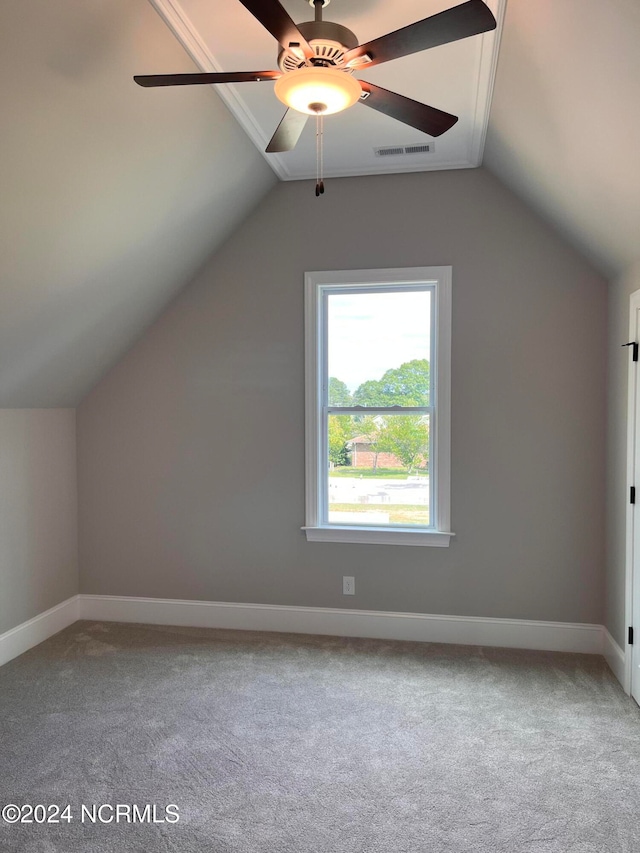 bonus room with lofted ceiling, ceiling fan, and carpet floors