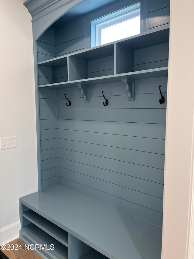 mudroom with hardwood / wood-style floors