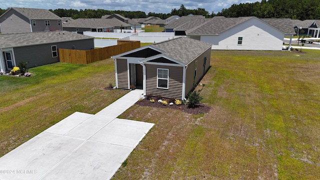 view of front of home featuring a front yard