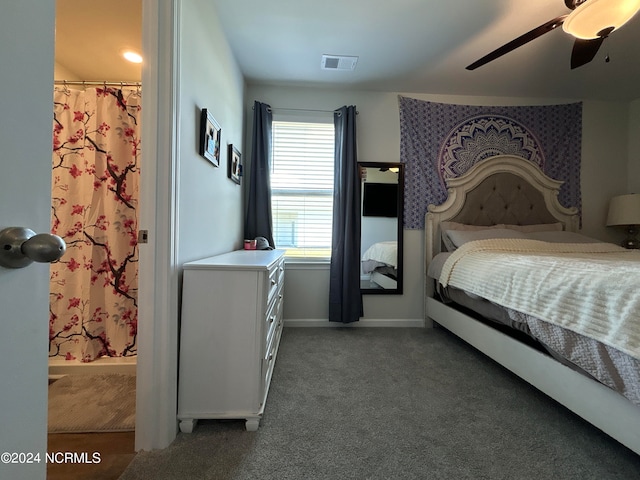 bedroom featuring ceiling fan and dark carpet