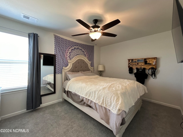 carpeted bedroom featuring ceiling fan