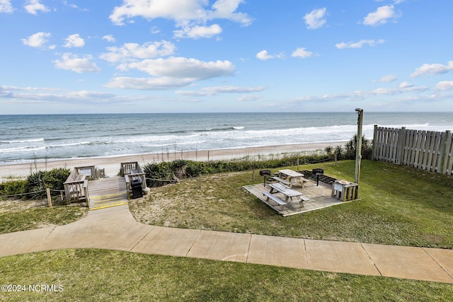 property view of water featuring a beach view