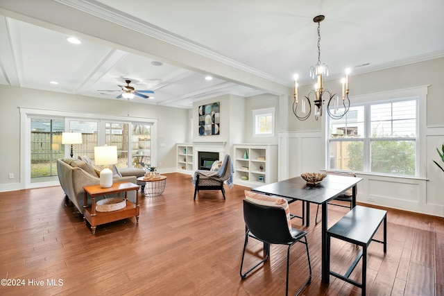 dining area featuring wood-type flooring and a wealth of natural light