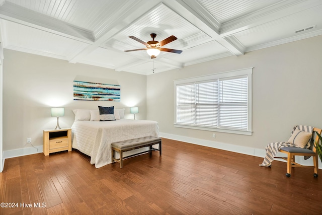 bedroom featuring ceiling fan, hardwood / wood-style floors, beamed ceiling, and crown molding