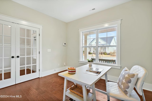 dining space featuring french doors and hardwood / wood-style flooring