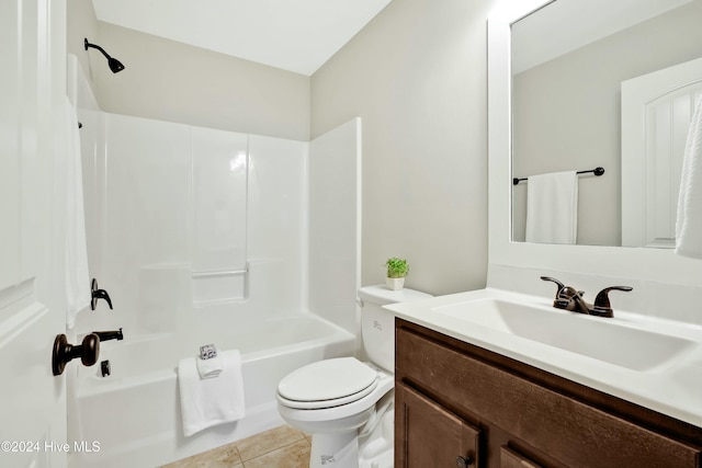 full bathroom featuring shower / washtub combination, tile patterned flooring, vanity, and toilet