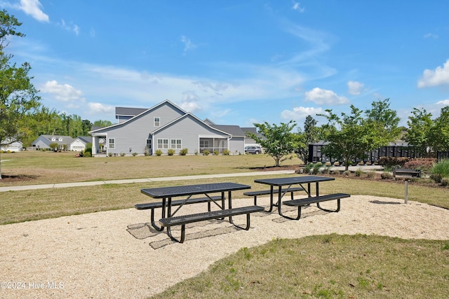 view of home's community featuring a yard