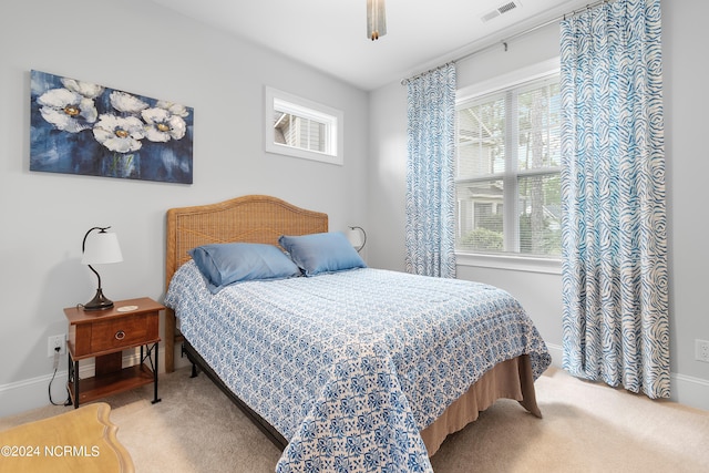 bedroom with carpet and ceiling fan