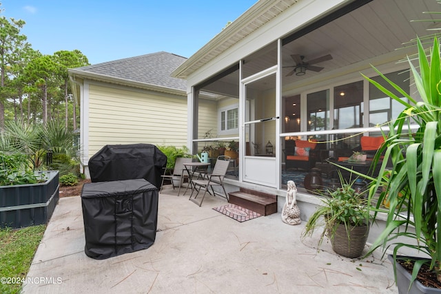 view of patio / terrace with grilling area and ceiling fan