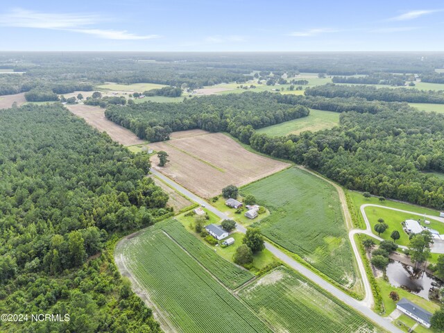 birds eye view of property featuring a rural view