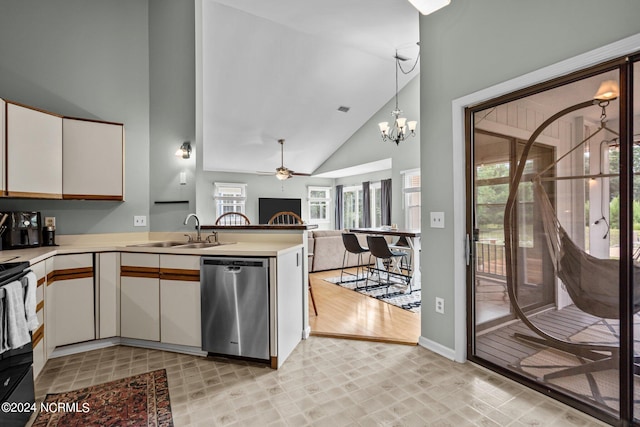 kitchen featuring white cabinets, dishwasher, ceiling fan with notable chandelier, and sink