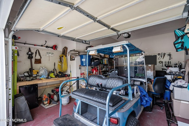 garage with a workshop area