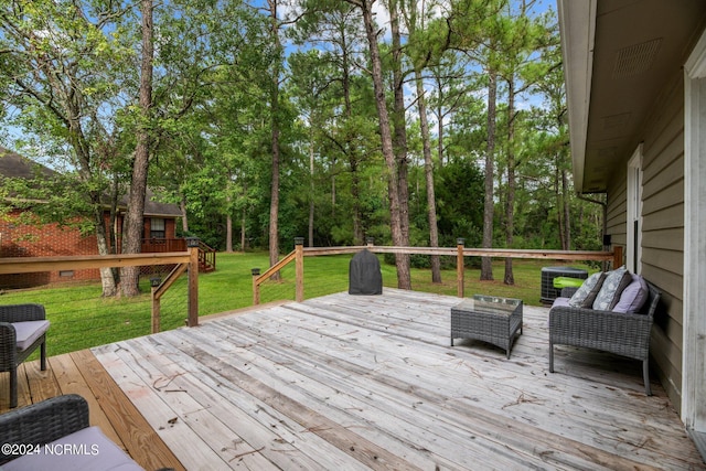 deck with a yard, an outdoor living space, and central AC unit