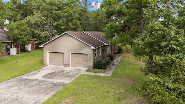 view of front facade with a front yard and a garage