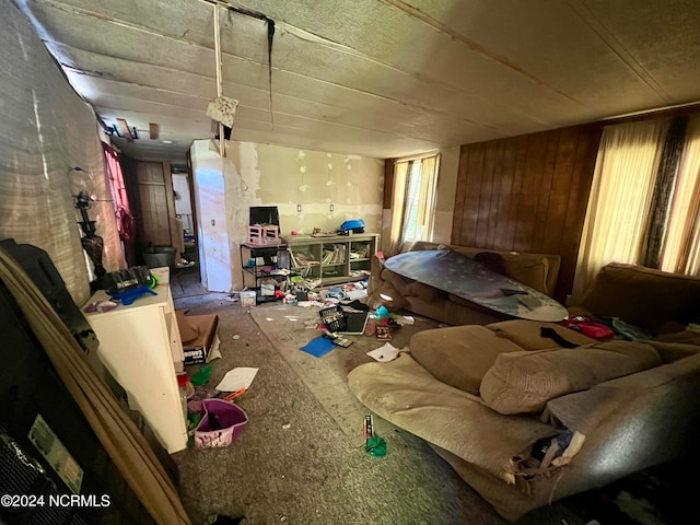 miscellaneous room featuring wood walls