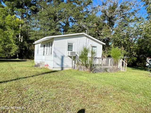 exterior space with a yard