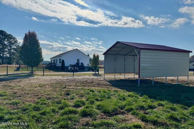 view of yard featuring a carport