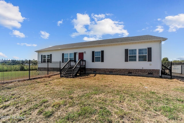 view of front facade with a front lawn