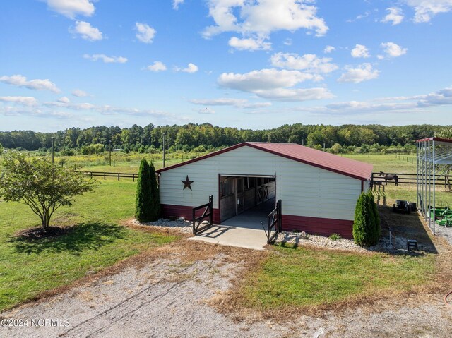 view of outdoor structure featuring a rural view