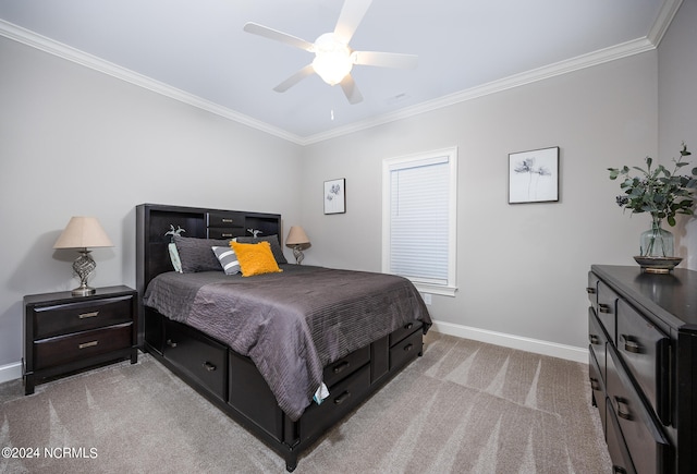 bedroom with ceiling fan, light carpet, and crown molding