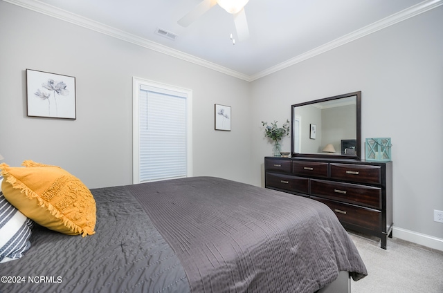 bedroom with crown molding, light carpet, and ceiling fan