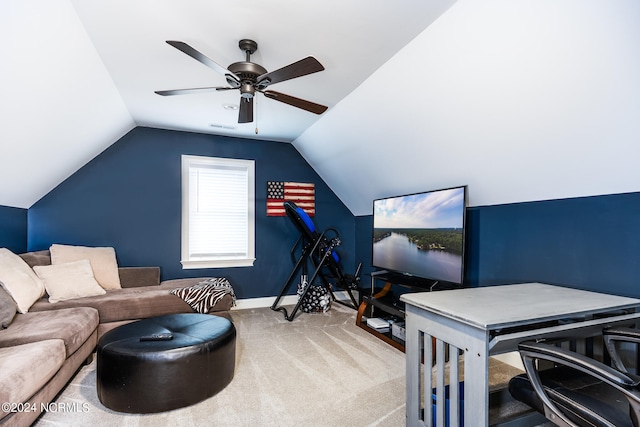 interior space with ceiling fan, lofted ceiling, and carpet