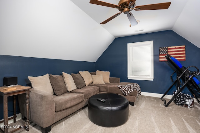 carpeted living room with vaulted ceiling and ceiling fan