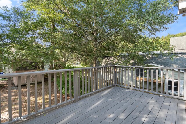 wooden deck with ceiling fan