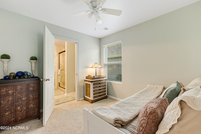 bedroom with ceiling fan and light colored carpet