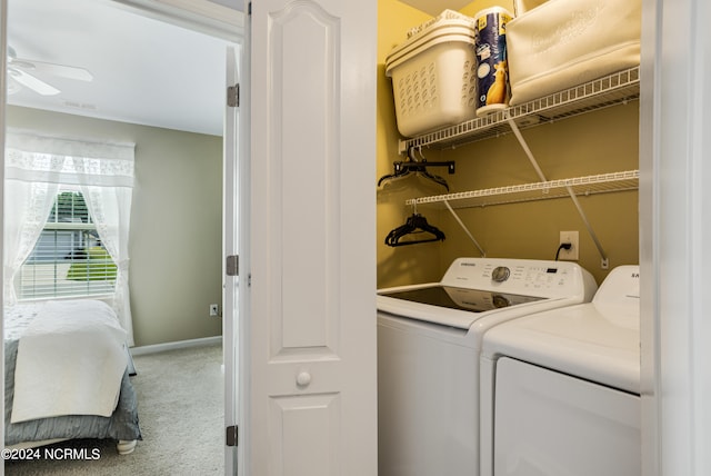 laundry area featuring ceiling fan, washer and clothes dryer, and carpet