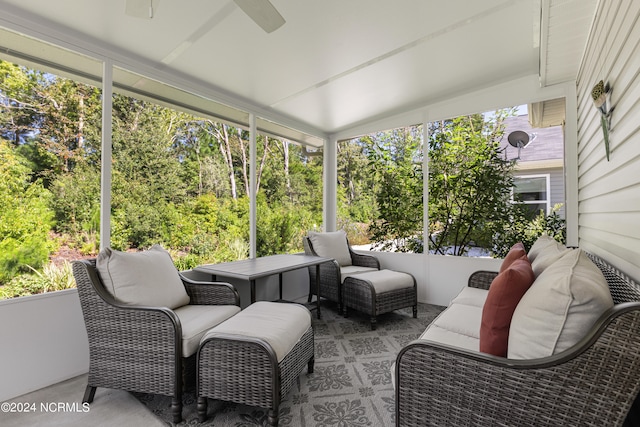 sunroom / solarium featuring ceiling fan and a wealth of natural light