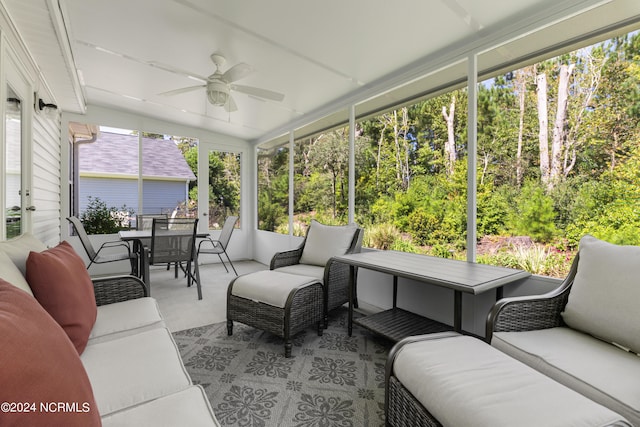 sunroom / solarium with ceiling fan and plenty of natural light