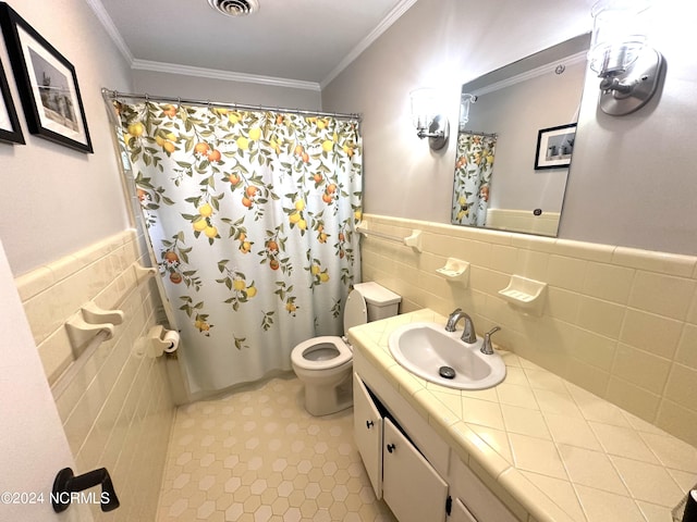 bathroom with a shower with shower curtain, crown molding, vanity, and toilet