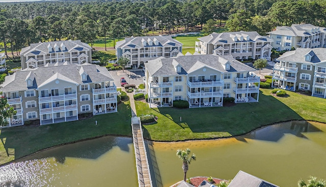 bird's eye view with a water view