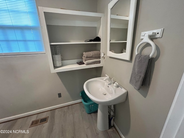 bathroom featuring hardwood / wood-style flooring