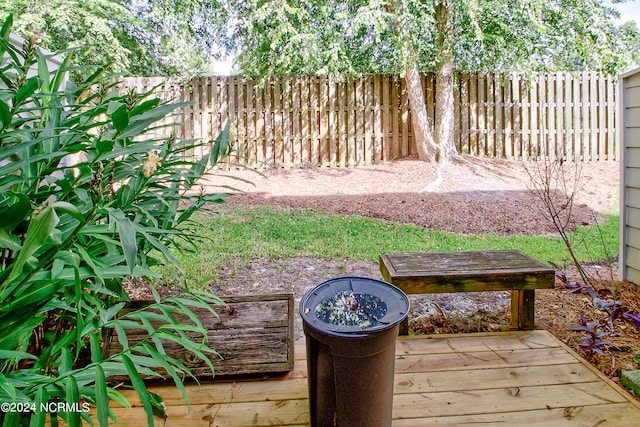 view of yard featuring a wooden deck